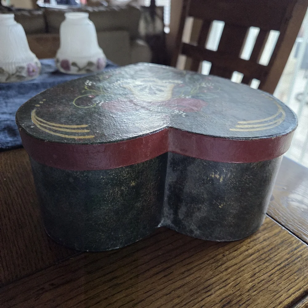 Folk Art Painted Heart Shaped Box With A Christmas Bell Painted On Top.